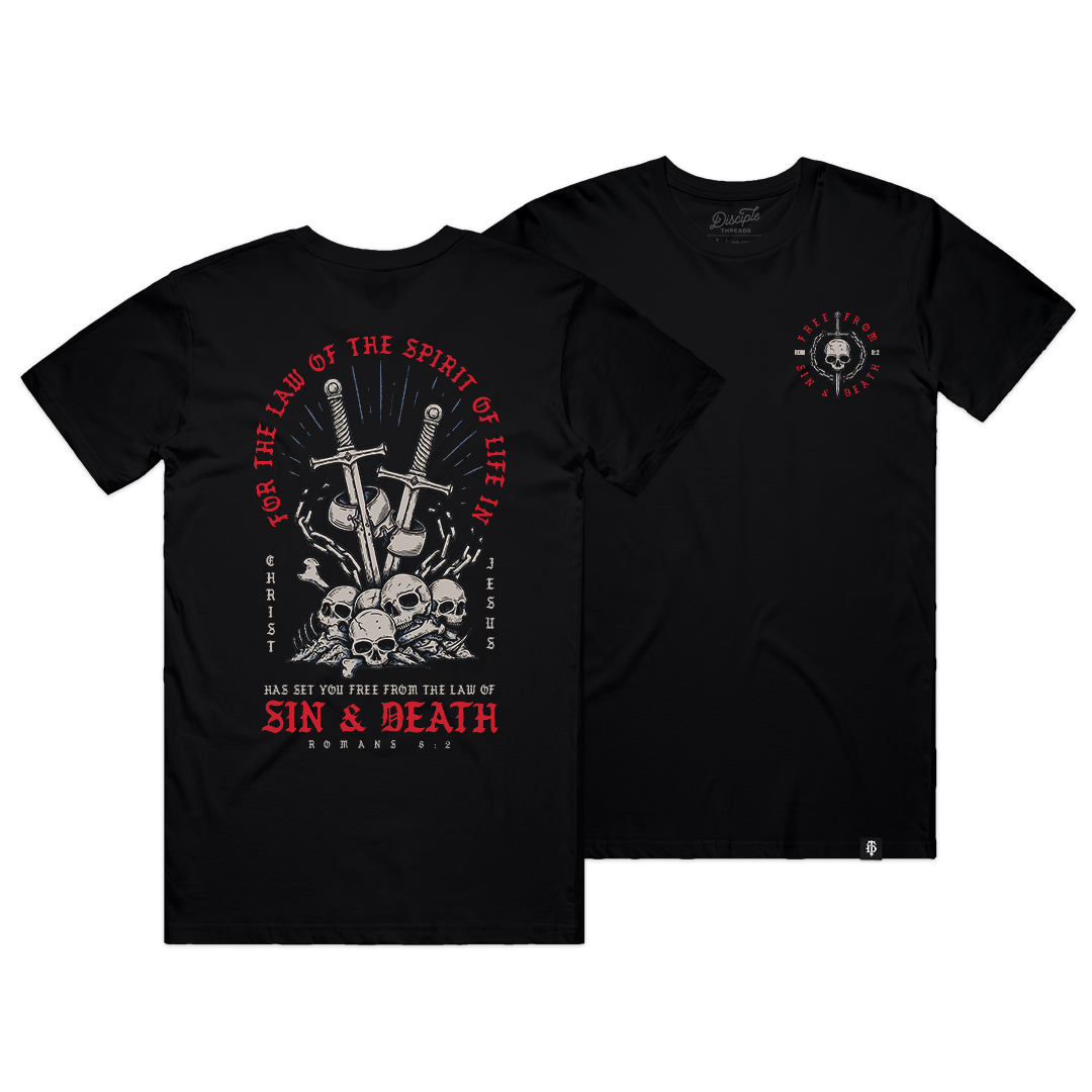 Two black t-shirts with Romans 8:2 graphic designs on a white background