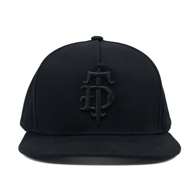 Black on black puff embroidered Disciple Threads monogram logo flat bill hat. Features "Freedom in Truth" embroidered on the side.