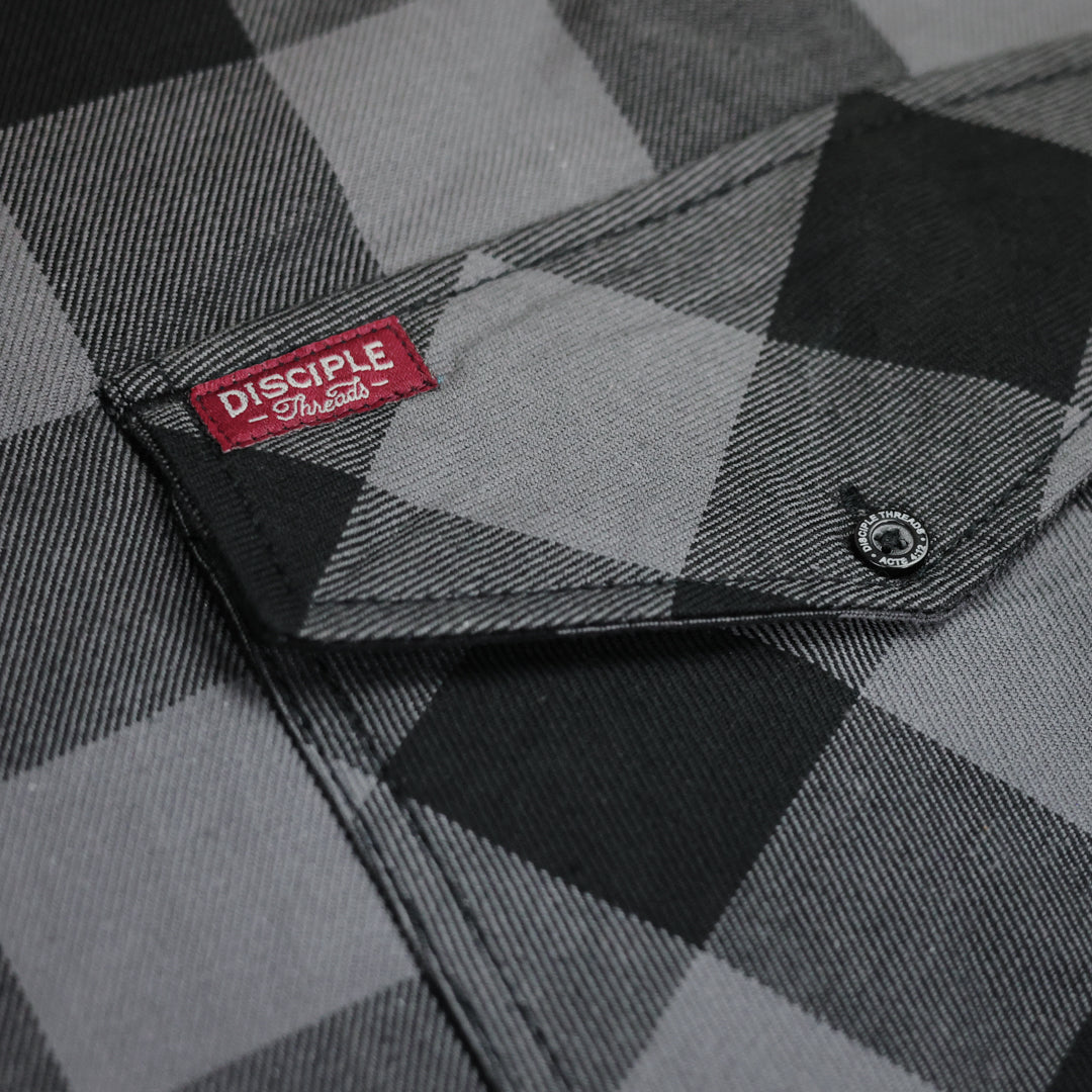 Black and grey flannel pocket details