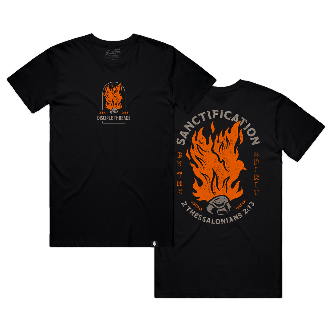 Black Sanctification T-shirt with a small flaming dove chest graphic and a large Sanctification by the Spirit graphic, 2 Thessalonians 2:13.