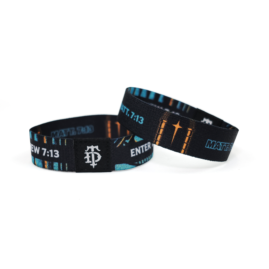 Two bracelets with scripture and artwork.