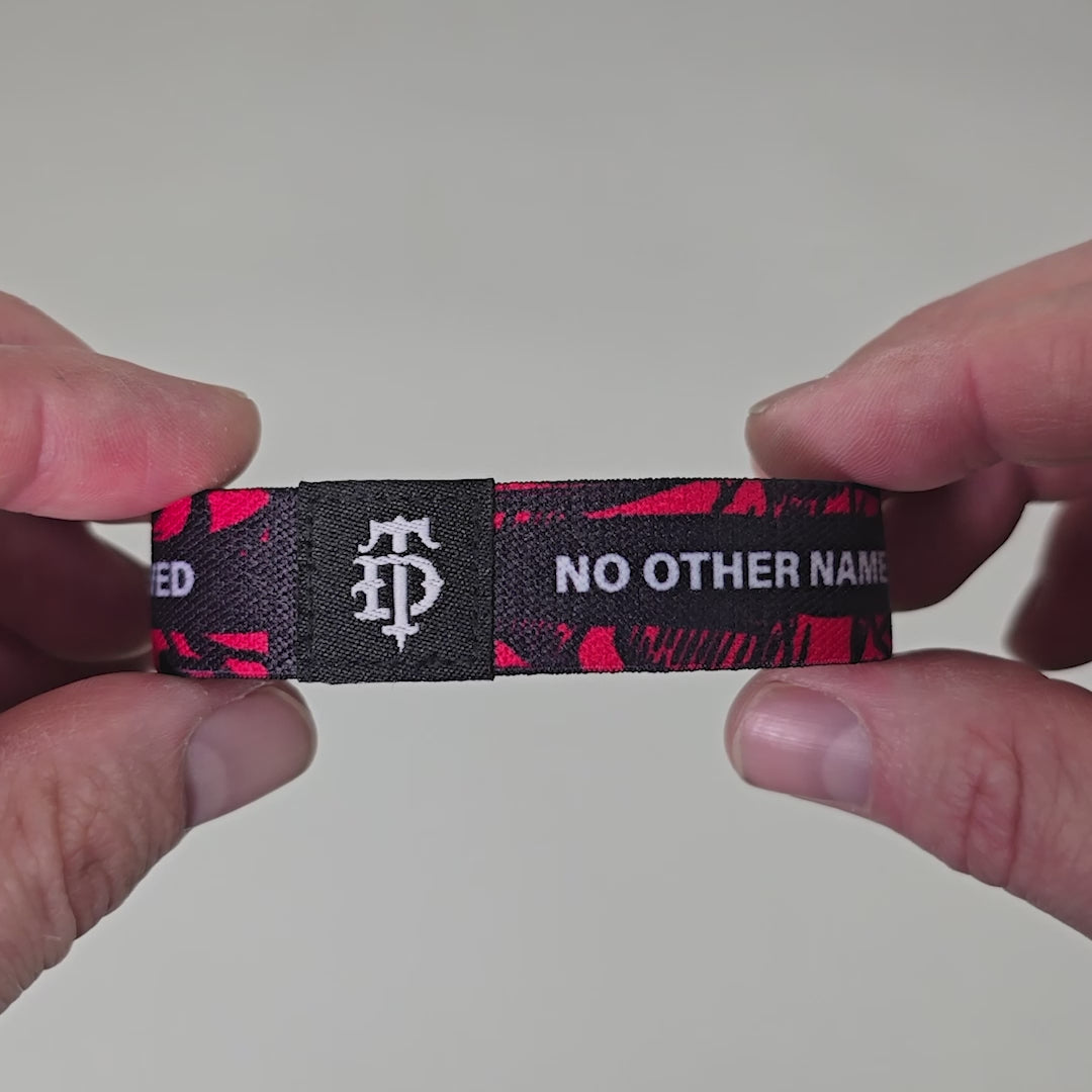 Video showing stretchy bracelet with scripture and artwork.